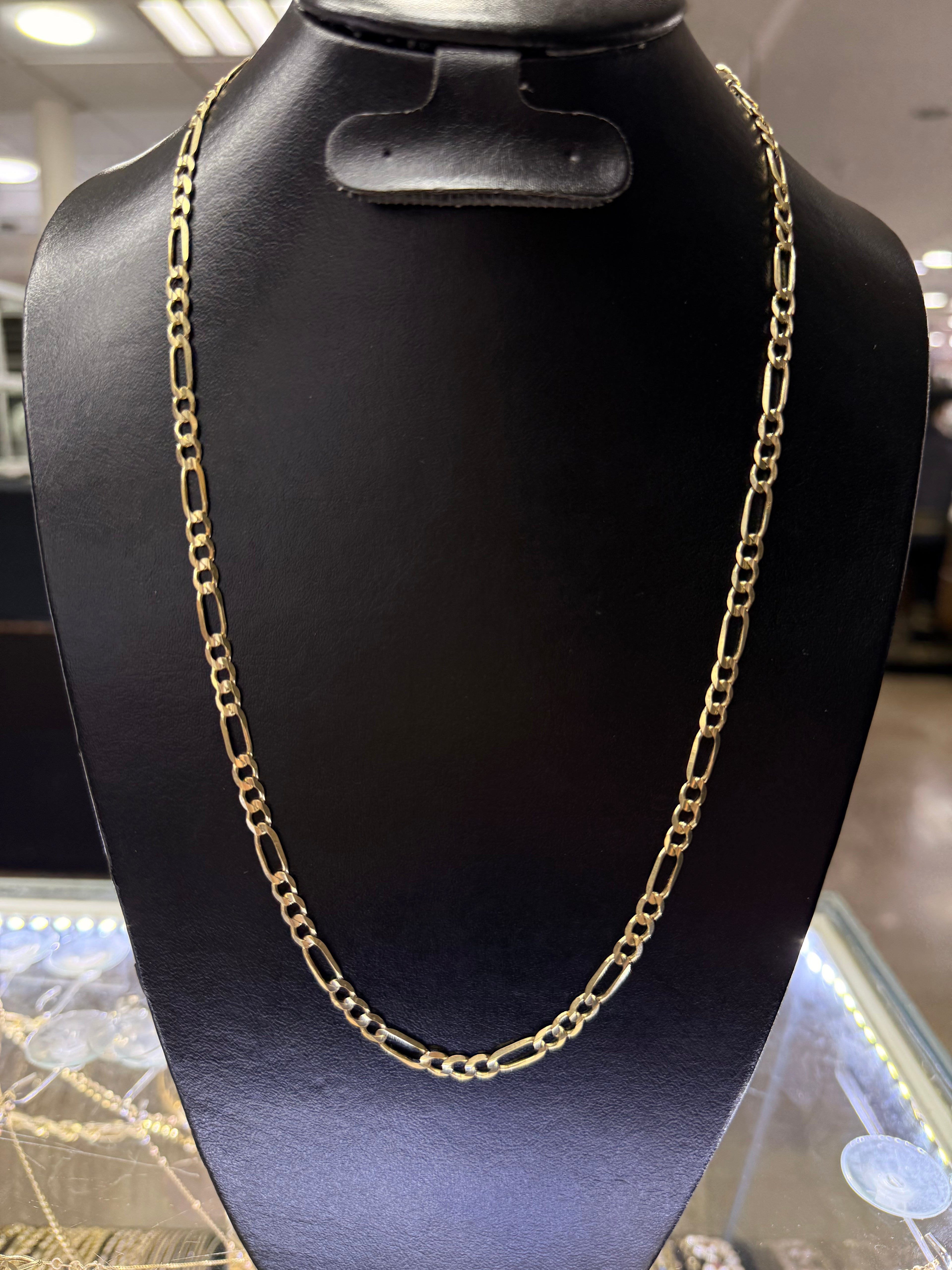 Cadena fígaro tejido 3x1 sólida en oro 10k de 5mm